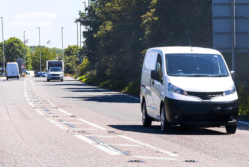 Small van driving along UK dual carriageway