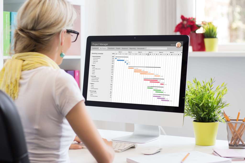 Business owner using a Gantt Chart