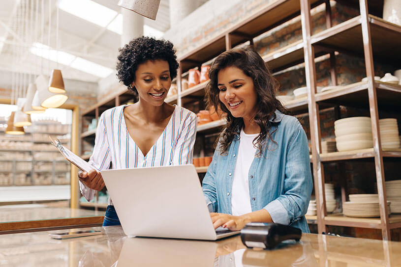 Two women selling ceramics online