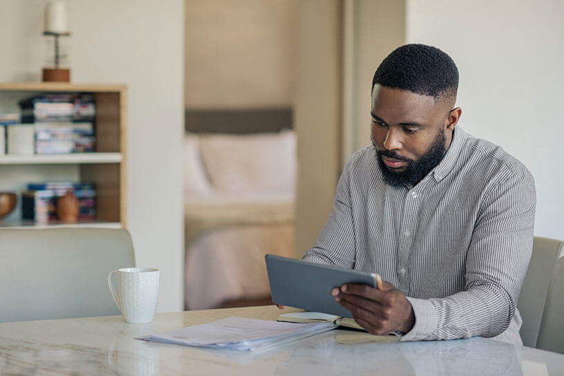 Man using tablet for business admin