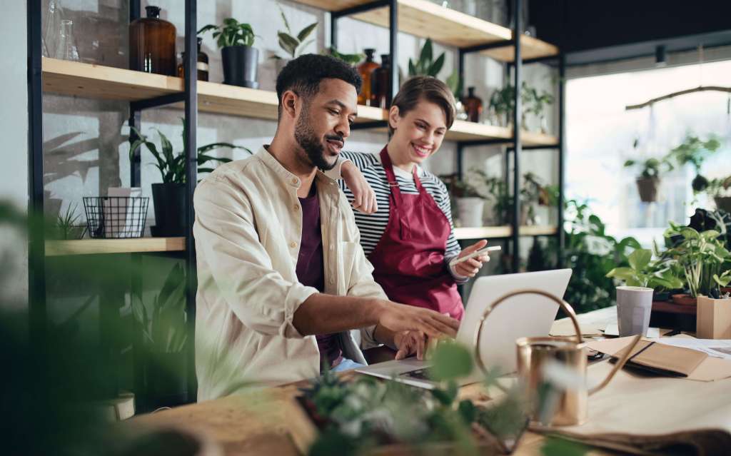 Two people working in a plant shop